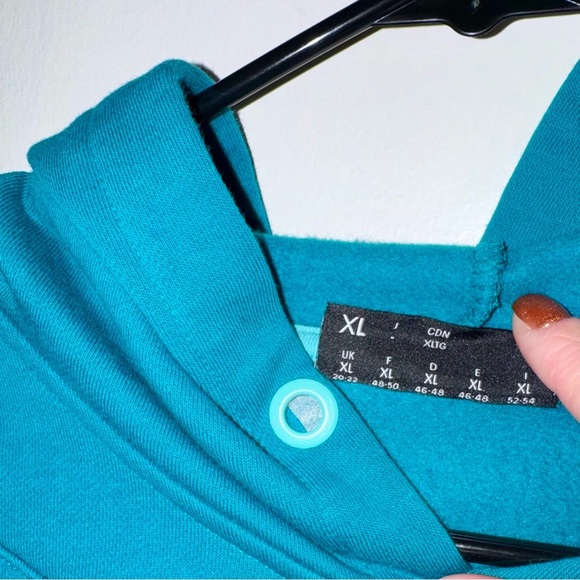 Reebok x Cardi B Teal Cropped Hoodie w/ Open Elbows - Picture 8 of 15